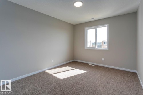 7113 51 Avenue, Beaumont, AB - Indoor Photo Showing Other Room