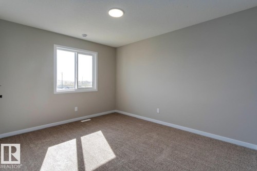 7113 51 Avenue, Beaumont, AB - Indoor Photo Showing Other Room