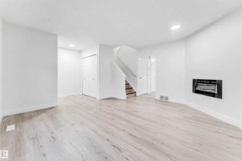 2911 26 Street, Edmonton, AB - Indoor With Fireplace