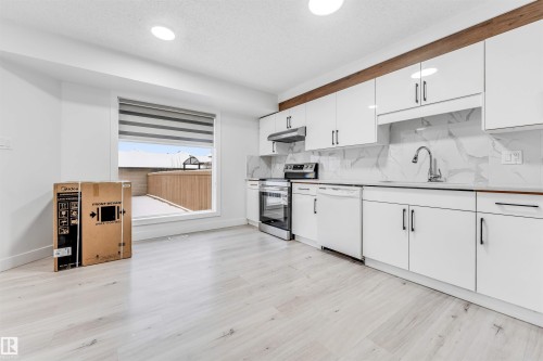 2911 26 Street, Edmonton, AB - Indoor Photo Showing Kitchen