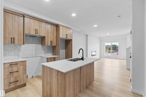 6373 King Wynd, Edmonton, AB - Indoor Photo Showing Kitchen With Double Sink