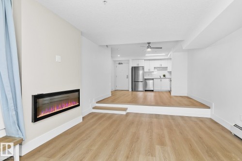 114 9504 182 Street, Edmonton, AB - Indoor Photo Showing Other Room With Fireplace