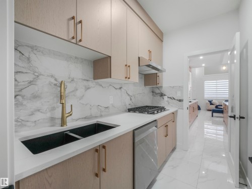 3519 45 Avenue, Beaumont, AB - Indoor Photo Showing Kitchen With Double Sink With Upgraded Kitchen