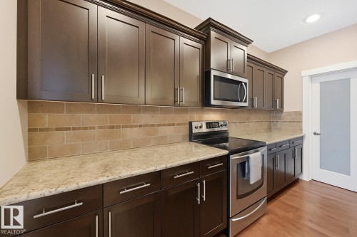 2292 Warry Loop, Edmonton, AB - Indoor Photo Showing Kitchen With Upgraded Kitchen