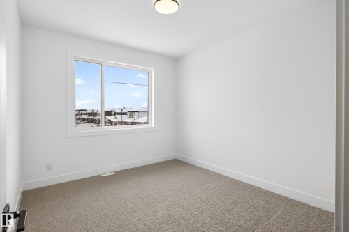 82 Baker Street, Ardrossan, AB - Indoor Photo Showing Other Room