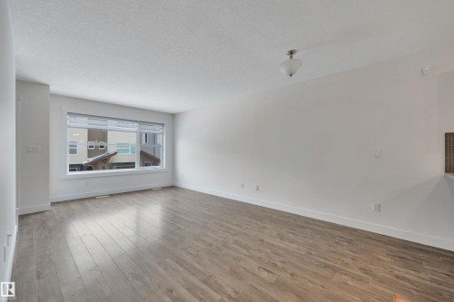 197 401 Southfork Drive, Leduc, AB - Indoor Photo Showing Living Room