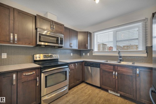 197 401 Southfork Drive, Leduc, AB - Indoor Photo Showing Kitchen With Double Sink