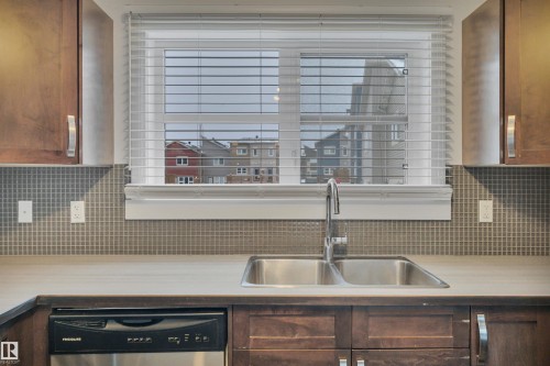 197 401 Southfork Drive, Leduc, AB - Indoor Photo Showing Kitchen With Double Sink