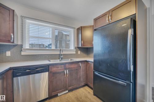 197 401 Southfork Drive, Leduc, AB - Indoor Photo Showing Kitchen With Double Sink
