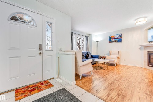 1098 Grantham Dr, Edmonton, AB - Indoor Photo Showing Other Room With Fireplace