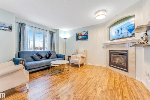 1098 Grantham Dr, Edmonton, AB - Indoor Photo Showing Living Room With Fireplace