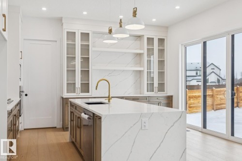 143 25122 Sturgeon Road, Rural Sturgeon County, AB - Indoor Photo Showing Kitchen With Upgraded Kitchen