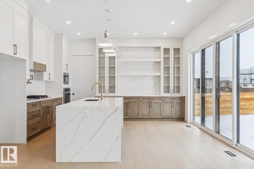 143 25122 Sturgeon Road, Rural Sturgeon County, AB - Indoor Photo Showing Kitchen With Upgraded Kitchen