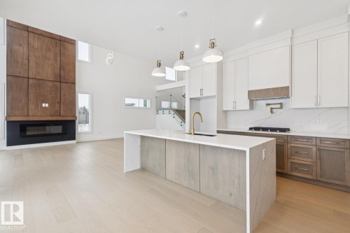 143 25122 Sturgeon Road, Rural Sturgeon County, AB - Indoor Photo Showing Kitchen With Upgraded Kitchen