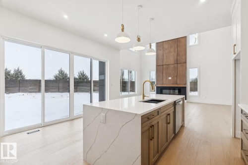143 25122 Sturgeon Road, Rural Sturgeon County, AB - Indoor Photo Showing Kitchen With Double Sink With Upgraded Kitchen