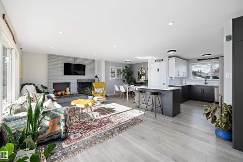 6304 94A Avenue, Edmonton, AB - Indoor Photo Showing Living Room With Fireplace