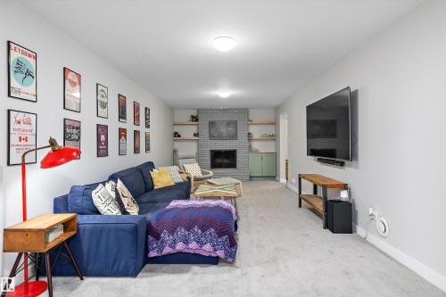 6304 94A Avenue, Edmonton, AB - Indoor Photo Showing Living Room With Fireplace