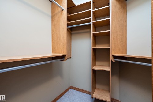 View of walk in closet - 4931 48 Avenue, Onoway, AB - Indoor With Storage