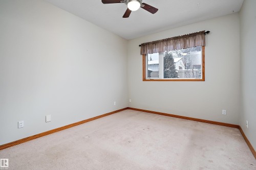 Spare room with light carpet and ceiling fan - 4931 48 Avenue, Onoway, AB - Indoor Photo Showing Other Room
