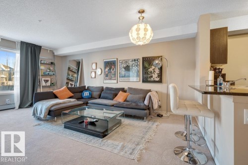 209 530 Watt Boulevard, Edmonton, AB - Indoor Photo Showing Living Room