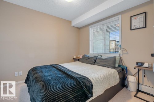 209 530 Watt Boulevard, Edmonton, AB - Indoor Photo Showing Bedroom