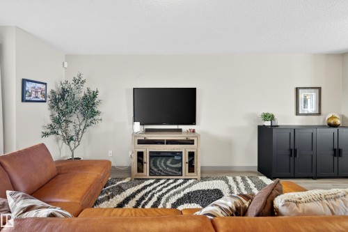 6 1150 Winderemere Way, Edmonton, AB - Indoor Photo Showing Living Room