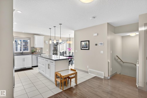 6 1150 Winderemere Way, Edmonton, AB - Indoor Photo Showing Kitchen With Upgraded Kitchen