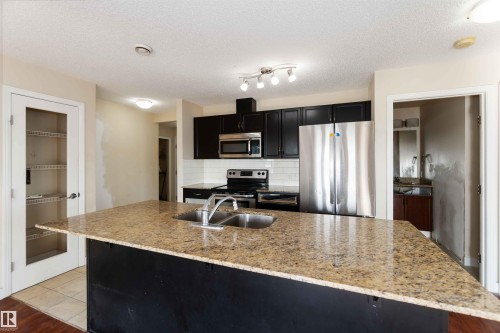 214 12660 142 Avenue, Edmonton, AB - Indoor Photo Showing Kitchen With Stainless Steel Kitchen With Double Sink With Upgraded Kitchen