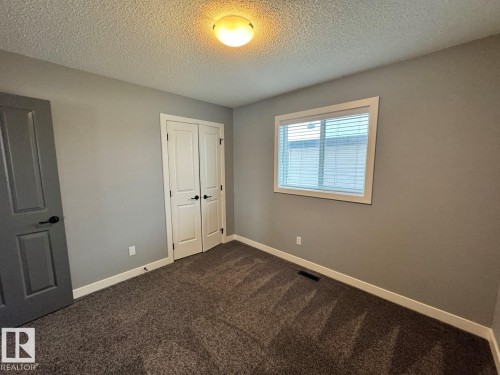 1352 Secord Landing Landing, Edmonton, AB - Indoor Photo Showing Other Room