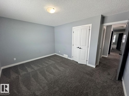 1352 Secord Landing Landing, Edmonton, AB - Indoor Photo Showing Other Room