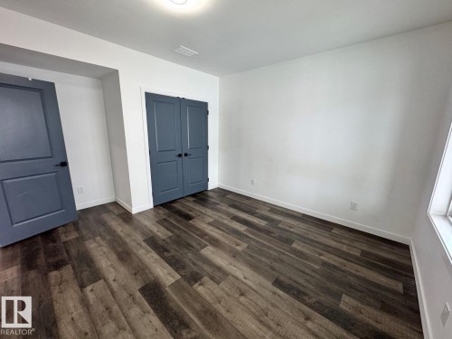 1352 Secord Landing Landing, Edmonton, AB - Indoor Photo Showing Other Room