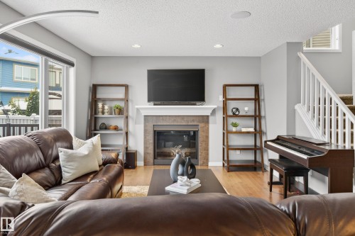 21711 85 Avenue, Edmonton, AB - Indoor Photo Showing Living Room With Fireplace