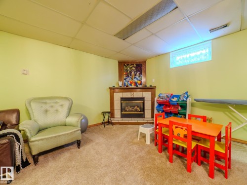15212 60 Street, Edmonton, AB - Indoor Photo Showing Other Room With Fireplace