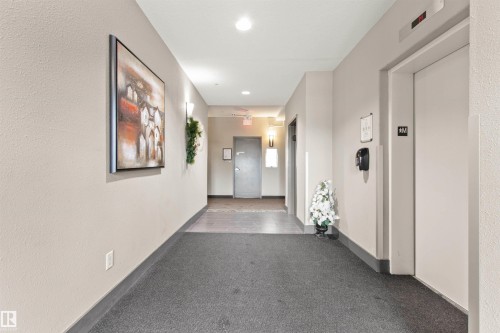 425 6083 Maynard Way E, Edmonton, AB - Indoor Photo Showing Other Room