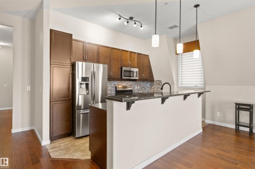 425 6083 Maynard Way E, Edmonton, AB - Indoor Photo Showing Kitchen With Upgraded Kitchen