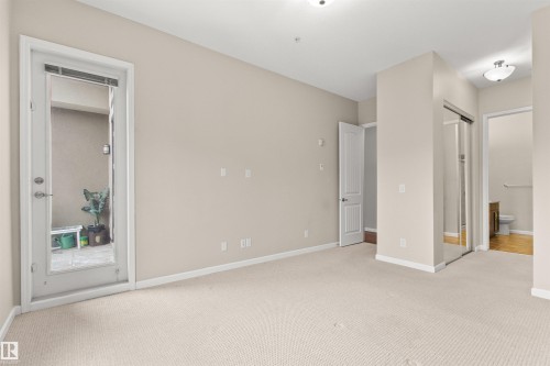 425 6083 Maynard Way E, Edmonton, AB - Indoor Photo Showing Other Room