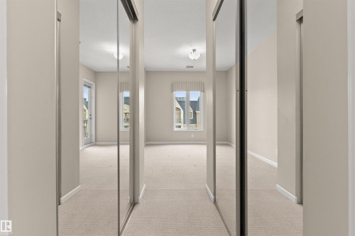 425 6083 Maynard Way E, Edmonton, AB - Indoor Photo Showing Other Room