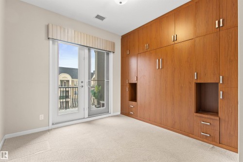 425 6083 Maynard Way E, Edmonton, AB - Indoor Photo Showing Other Room