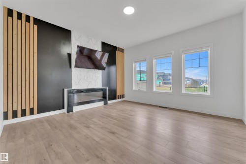 17711 73 Street, Edmonton, AB - Indoor Photo Showing Living Room With Fireplace