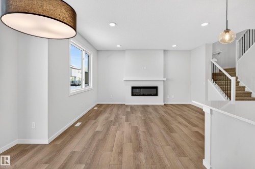 2251 194 Street, Edmonton, AB - Indoor Photo Showing Other Room With Fireplace