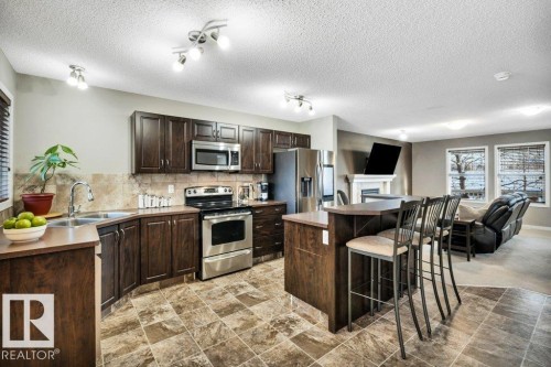 1512 70 Street Sw, Edmonton, AB - Indoor Photo Showing Kitchen With Double Sink