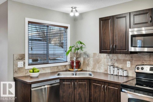 1512 70 Street Sw, Edmonton, AB - Indoor Photo Showing Kitchen With Double Sink