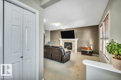 1512 70 Street Sw, Edmonton, AB - Indoor Photo Showing Other Room With Fireplace