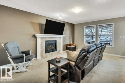1512 70 Street Sw, Edmonton, AB - Indoor Photo Showing Living Room With Fireplace
