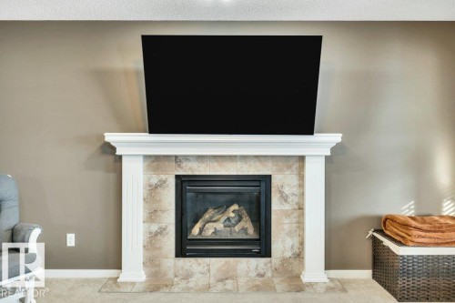 1512 70 Street Sw, Edmonton, AB - Indoor Photo Showing Living Room With Fireplace