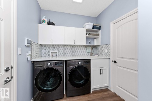 3211 62 Street, Beaumont, AB - Indoor Photo Showing Laundry Room