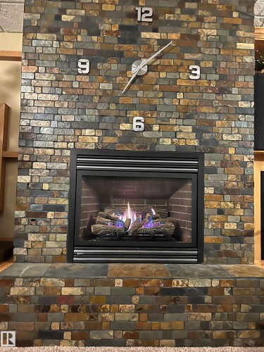 3211 62 Street, Beaumont, AB - Indoor With Fireplace