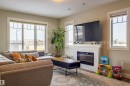 5704 Hawthorn Common, Edmonton, AB  - Indoor Photo Showing Living Room With Fireplace 