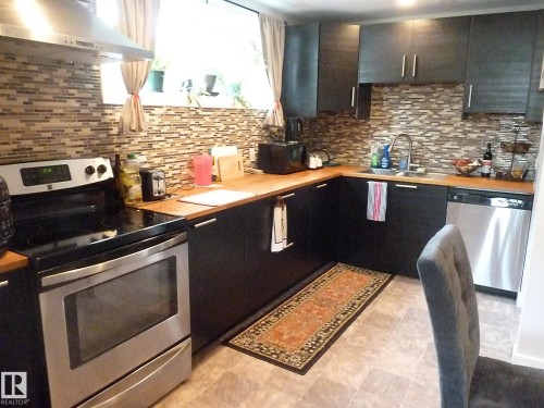 12836 107 Street, Edmonton, AB - Indoor Photo Showing Kitchen With Stainless Steel Kitchen With Double Sink With Upgraded Kitchen