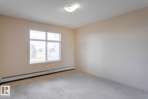 254 11517 Ellerslie Road, Edmonton, AB - Indoor Photo Showing Other Room